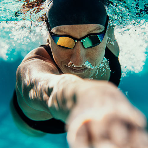 Lauren Brandon, one of the fastest swimmers in Triathlon uses THEMAGIC5 competition swimming goggles