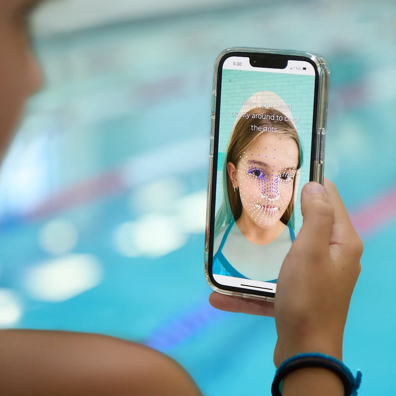 kid scanning their face to get goggles